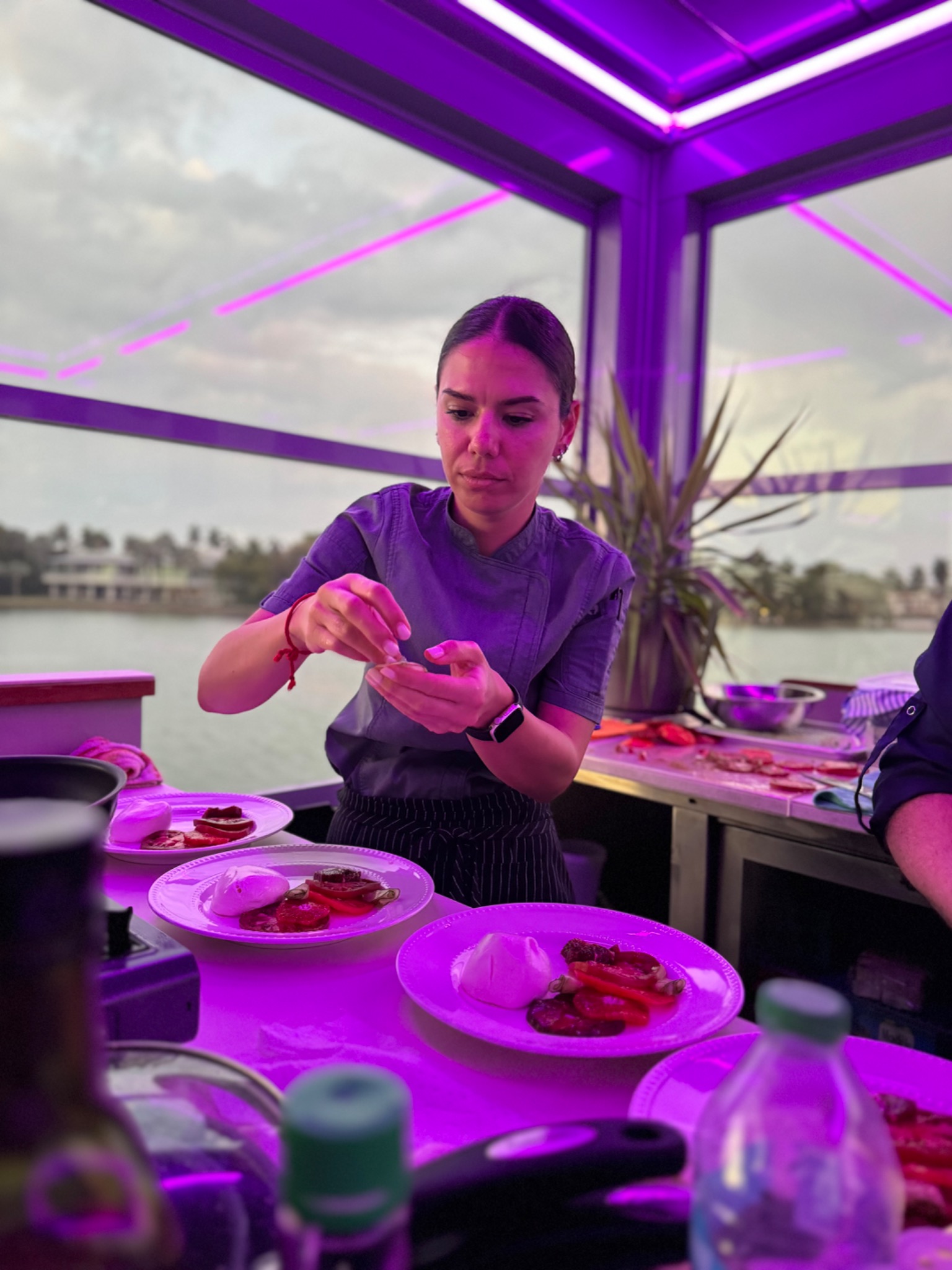Chef Simge plating on a yacht